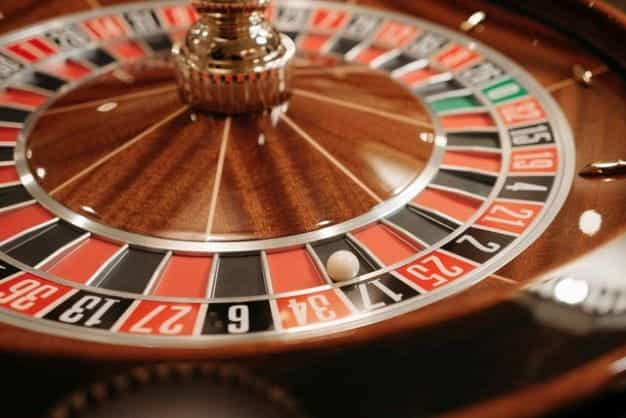 A roulette wheel with a white ball.