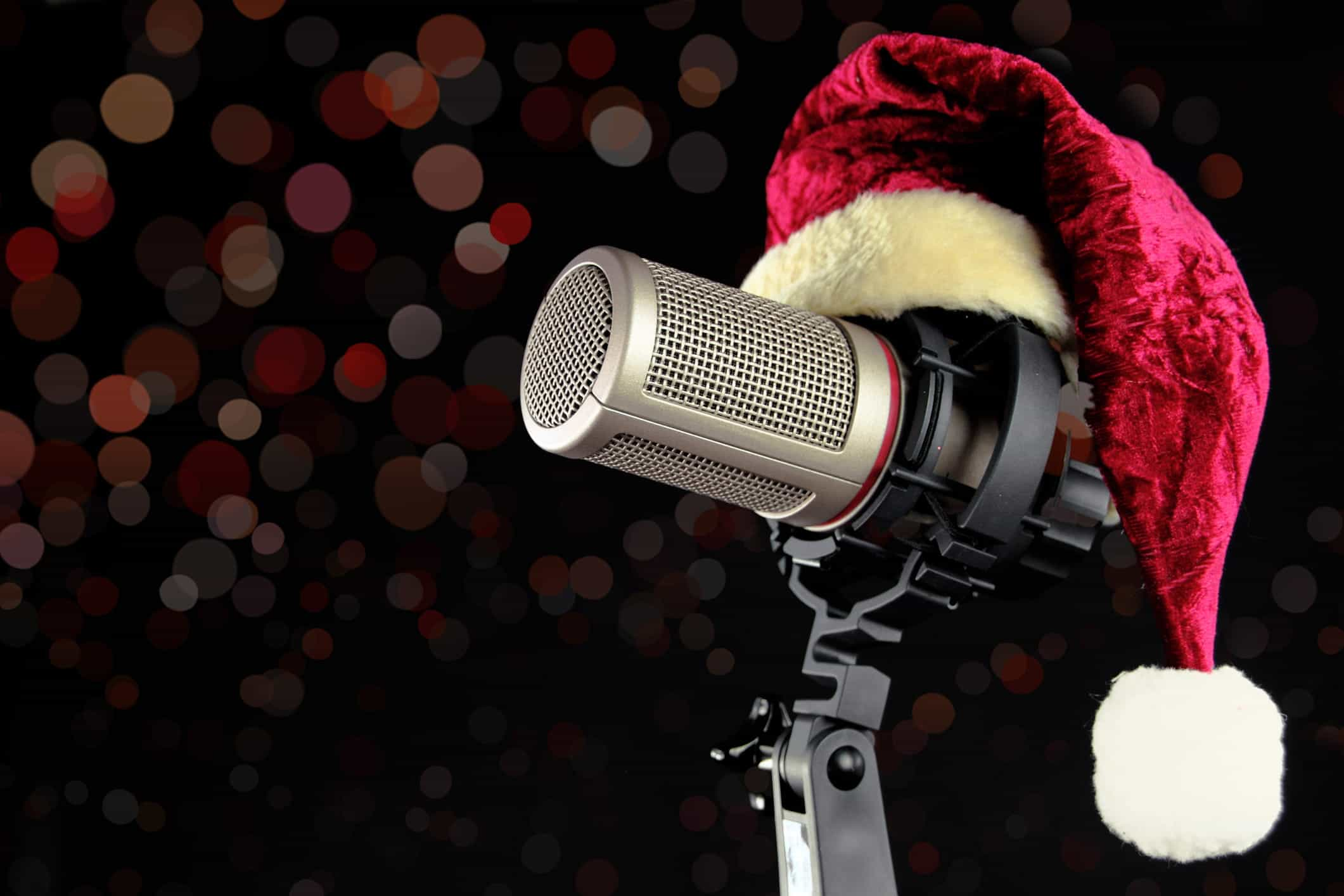 A Santa hat sitting on a microphone.