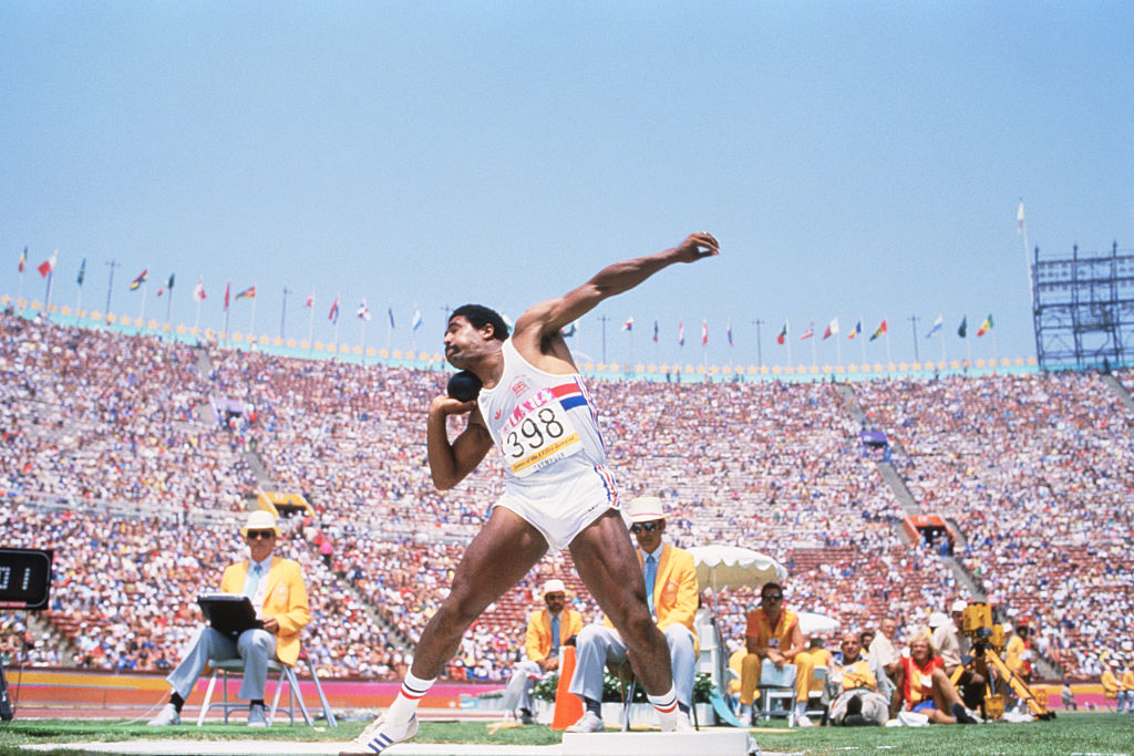 Daley Thompson putting the shot during the decathlon at the 1984 Olympic Games.